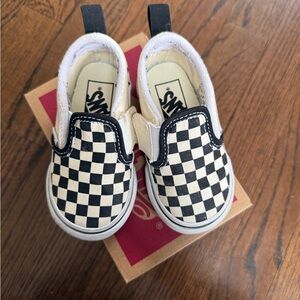Like new- Vans Black and White Checkerboard Slip-On Sneakers